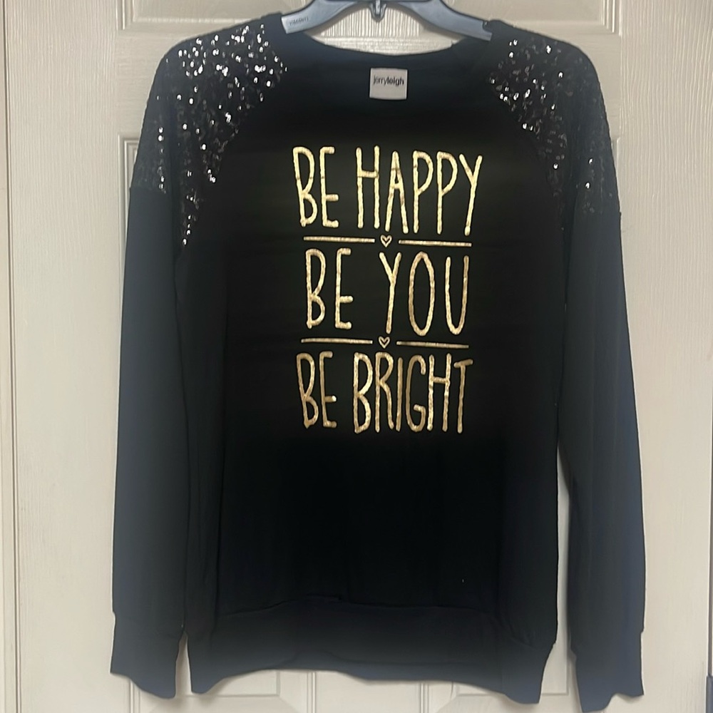 Jerryleigh size medium top. Black with sequins on the shoulders. Great condition